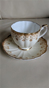 Victoria C and E bone china English teacup saucer collectible white yellow and gold design in embossed pattern porcelain