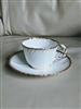 Cauldon Ware porcelain teacup and saucer embossed white porcelain with gold tone accents collectible