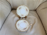 Vintage Noritake Milford pattern porcelain saucers with floral design and gold trim
