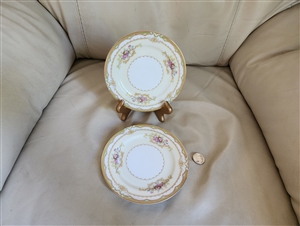 Vintage Noritake Milford pattern porcelain saucers with floral design and gold trim