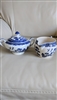 Johnson Brothers Blue Willow English earthenware lidded sugar bowl and creamer pitcher set in cobalt blue transferware from the 1950s
