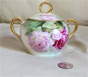 Antique Thomas Bavaria porcelain two-handled lidded sugar bowl decorated with pink cabbage roses and gold gilded loop handle