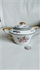 Chas Field Haviland Limoges France porcelain lidded sugar bowl featuring floral bouquets blue and gold borders and gold handles from the 1920s
