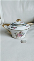 Chas Field Haviland Limoges France porcelain lidded sugar bowl featuring floral bouquets blue and gold borders and gold handles from the 1920s