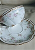 Antique Theodore Haviland Limoges porcelain teacup and saucer set with pink roses and gold trim