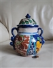 Vintage Mexican Talavera pottery ginger jar with handles and colorful floral painting