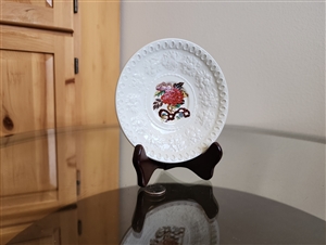 Vintage Wedgwood Bullfinch Wellesley porcelain saucer with embossed fruit rim and colorful floral center