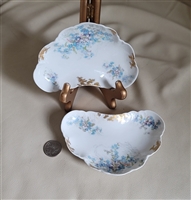 GDA Limoges antique French porcelain floral bone plates kidney shaped set of two with gold trim