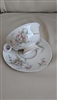 Preowned vintage Theodore Haviland New York Apple Blossom teacup and saucer set