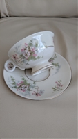 Preowned vintage Theodore Haviland New York Apple Blossom teacup and saucer set