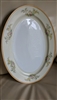 Meito oval serving plate, 16-1/4" long with floral decor and gold rim.