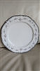 Noritake Traviata round chop plate with ivory china pink white floral blossoms and gray border, Top view of large Noritake Traviata serving platter showing scalloped rim and platinum trim detail, Close up of hand painted floral design on vintage Noritake