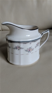Noritake Traviata pattern fine porcelain creamer pitcher with pink floral sprays and platinum silver trim from the 1980s