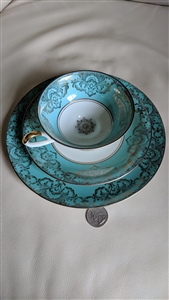 Gold floral over blue background Bavarian ALka porcelain teacup and plates set elegant design
