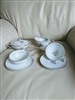 Noritake Daryl pattern vintage porcelain table setting with 2 teacups, saucers, creamer, and lidded sugar bowl from the 1950s