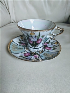 Lusterware footed teacup saucer floral Art Deco unmarked elegant tulips design over white porcelain