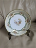 Vintage 1967 Noritake Lamara porcelain coupe soup bowl with blue floral design and gold trim on a white ground