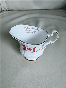 Elizabethan fine bone china creamer pitcher commemorating the British Columbia Centennial with Canadian flag from the 1970s