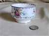 Preowned vintage Royal Albert fine bone china open sugar bowl measuring 3.125 inches wide by 2 inches tall in the embroidered Petit Point floral needlepoint pattern