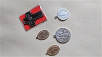 Set of religious metal medals pendants and a cross
