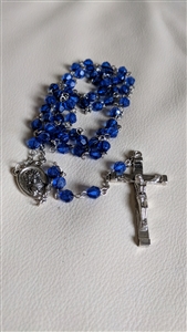pre-owned vintage blue faceted plastic bead rosary with silver tone inri crucifix