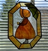 Preowned handmade stained glass hanging featuring a girl with an umbrella