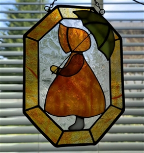 Preowned handmade stained glass hanging featuring a girl with an umbrella