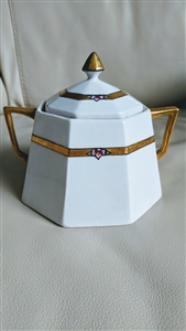 antique Nippon octagonal white porcelain lidded sugar bowl featuring Art Deco geometric gold bands heavy gold handles and floral accents from the 1920s