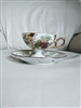 Preowned vintage Norcrest porcelain pedestal teacup and reticulated saucer set