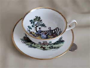 Royal Chelsea porcelain teacup and saucer table setting elegant display