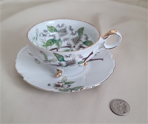 UCAGCO lustre teacup and saucer made in Japan in vivid colors design over white porcelain collectible