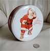The Real Santa round tin 1979 Coca-Cola collector series showing vintage oxidation and scratches