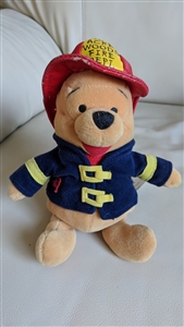 Vintage Disney Store mini bean bag plush Winnie the Pooh dressed as a firefighter in red hat and blue jacket