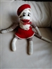 Vintage stuffed Sock Monkey in crochet dress handcrafted collectible display